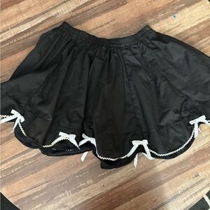 Chic Black Skater Skirt with White Bow Accents